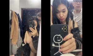 Cầm điện thoại cùng quay chịch video